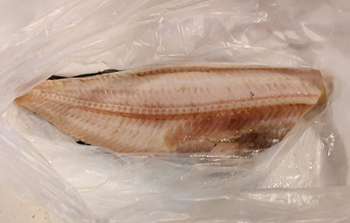 Hokke (Atka mackerel) topped with a Hinomaru (Japanese flag) bento