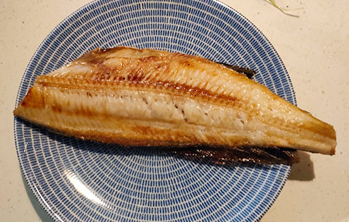 Hokke (Atka mackerel) topped with a Hinomaru (Japanese flag) bento